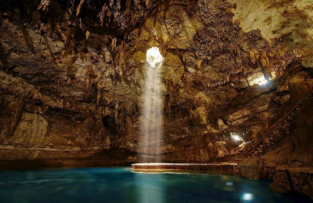 How to Get to Cenote Suytun: Discover the Easiest Way to Reach Yucatán’s Most Magical Cenote cenote suytun 5 Cenote Suytun showing natural light beam effect at midday versus peaceful early morning atmosphere without crowds